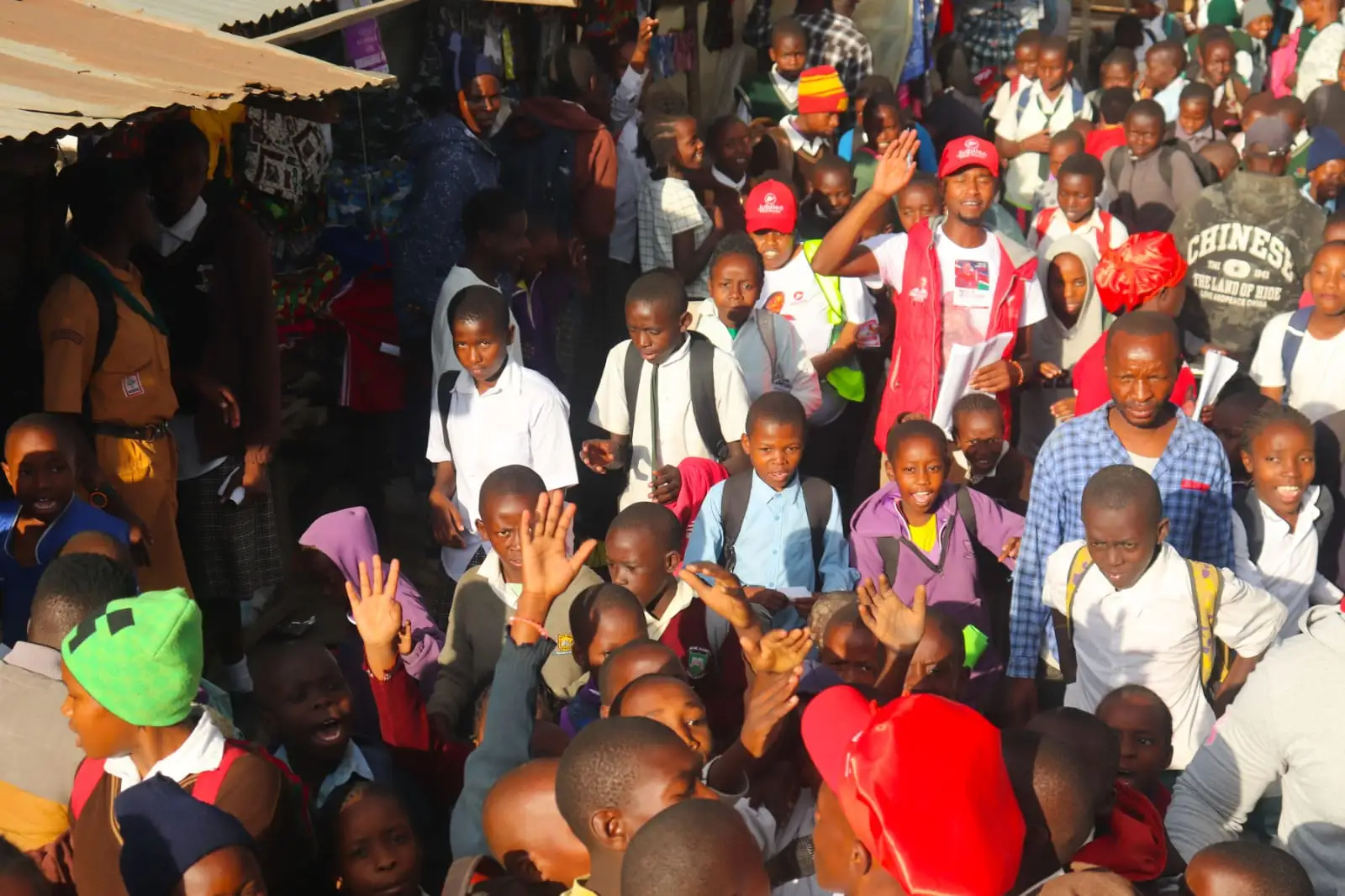 Large crowd of young people and students in a street